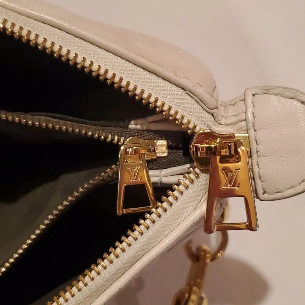 Authentic LOUIS VUITTON COUSSIN PM-Cream!